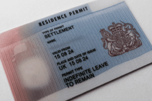 Permanent Residence vs Settled Status ID card Permanent residence ID card close up