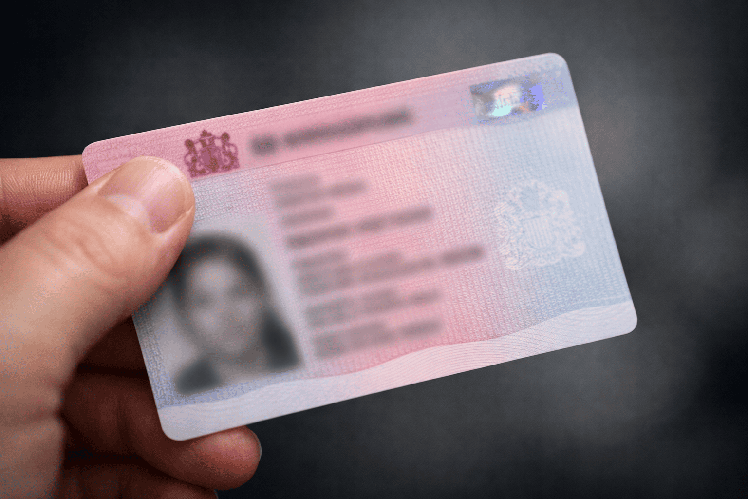 man holding skilled work visa for child